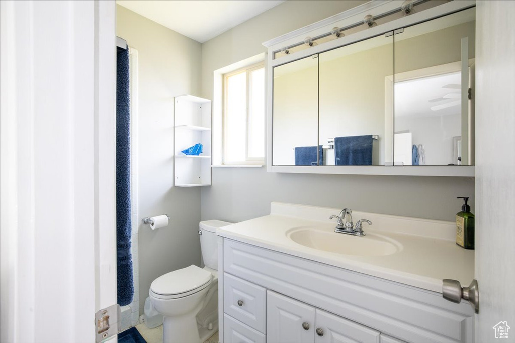 Bathroom featuring toilet and vanity