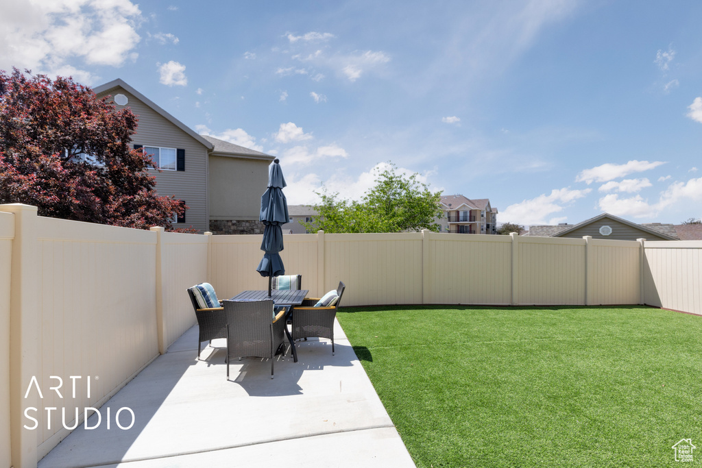 View of yard featuring a patio