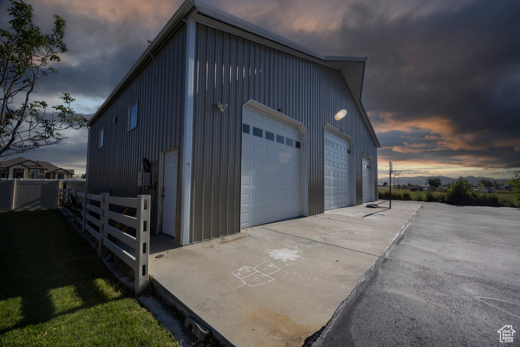Garage at dusk with a garage
