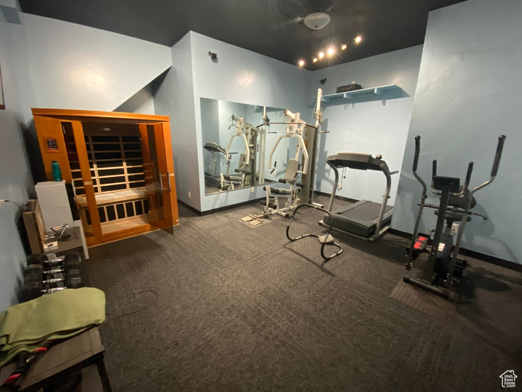 Exercise room featuring baseboards