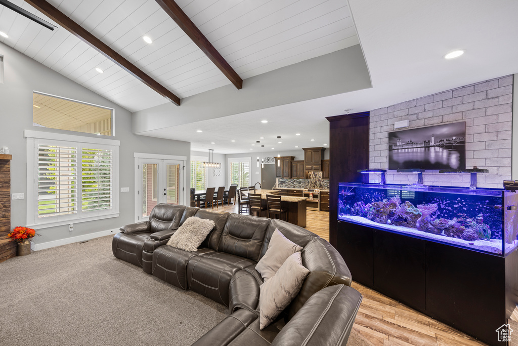 Living area with recessed lighting and baseboards