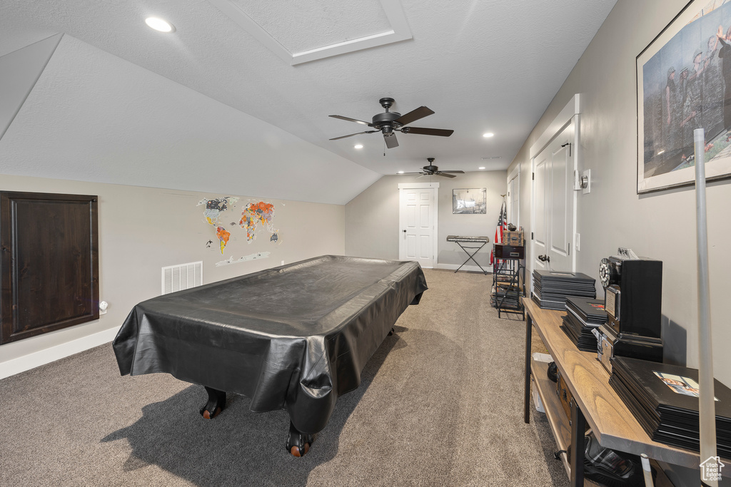 Game room featuring light carpet, billiards table, ceiling fan, baseboards, and vaulted ceiling