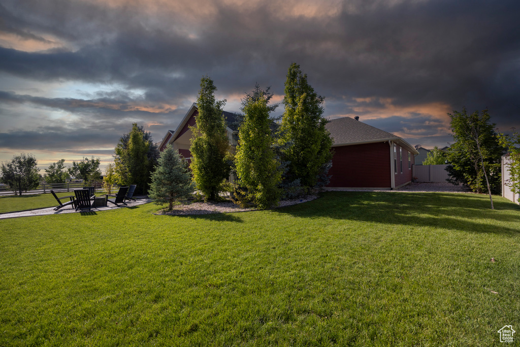 View of yard at dusk
