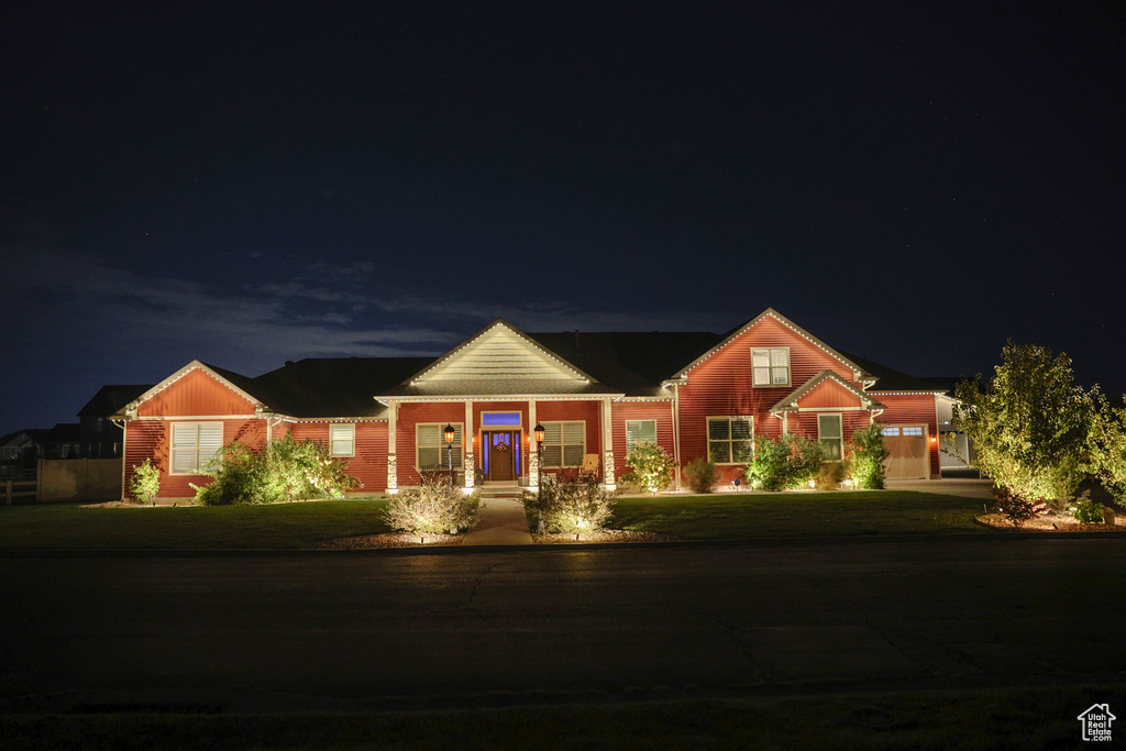 View of front of house with a lawn