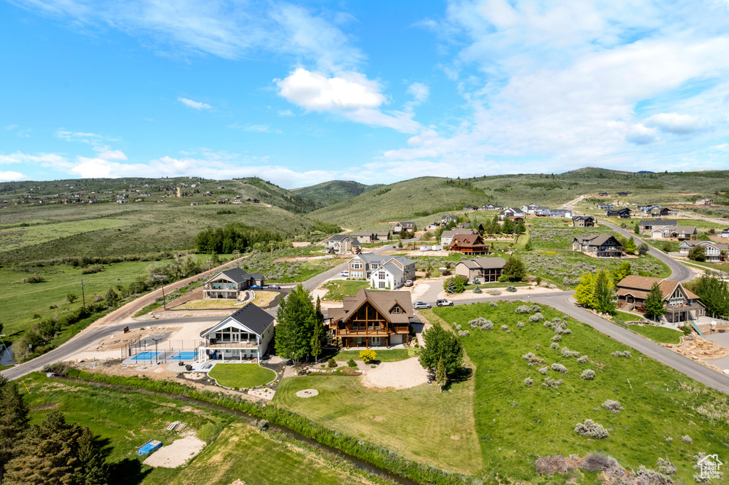 Aerial view of residential area with a mountain backdrop