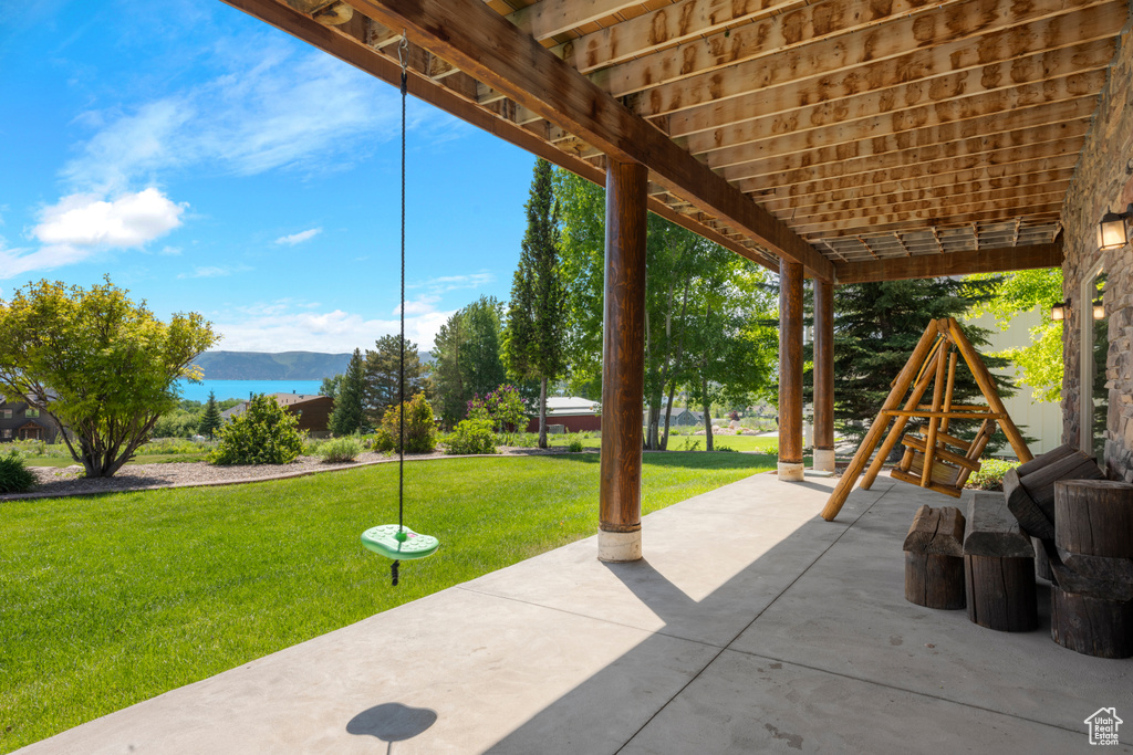 View of patio with a mountain view