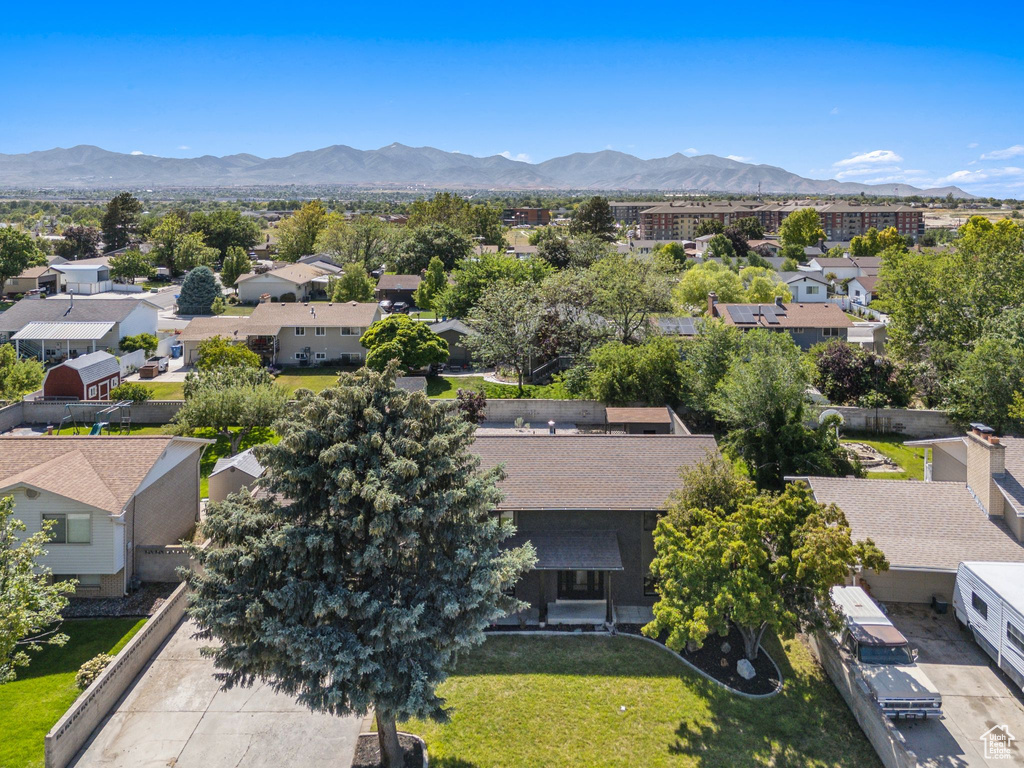 Aerial view of residential area with a mountainous background