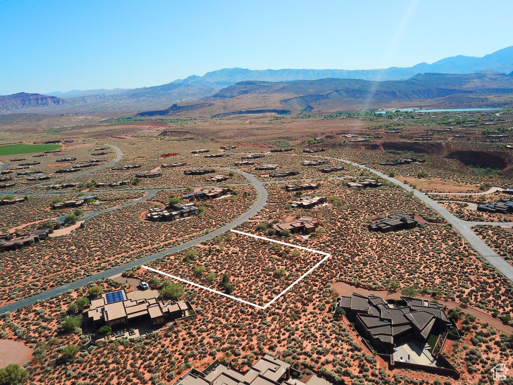 View of property location featuring a mountain backdrop and property parcel outlined