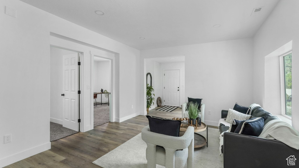 Living area featuring wood finished floors and baseboards