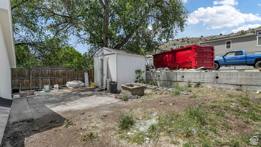 Fenced backyard featuring a patio area