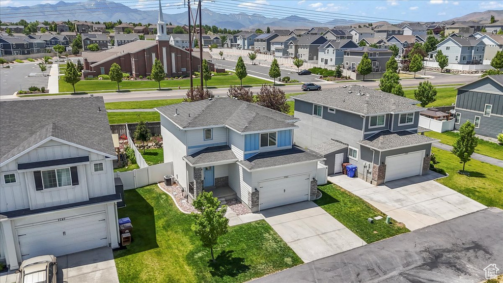 Aerial view of residential area with mountains