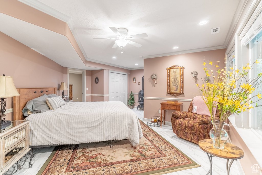 Bedroom featuring recessed lighting, marble finish flooring, a closet, ceiling fan, and crown molding