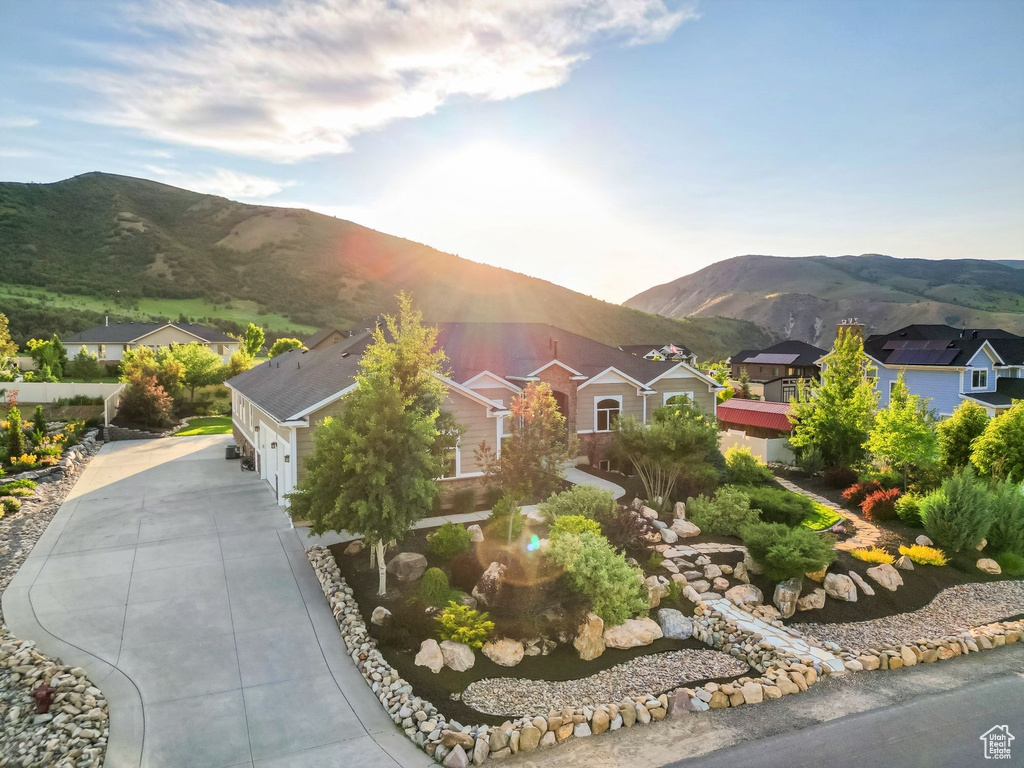 View of mountain background featuring nearby suburban area