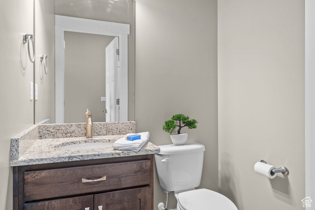 Bathroom with toilet and vanity