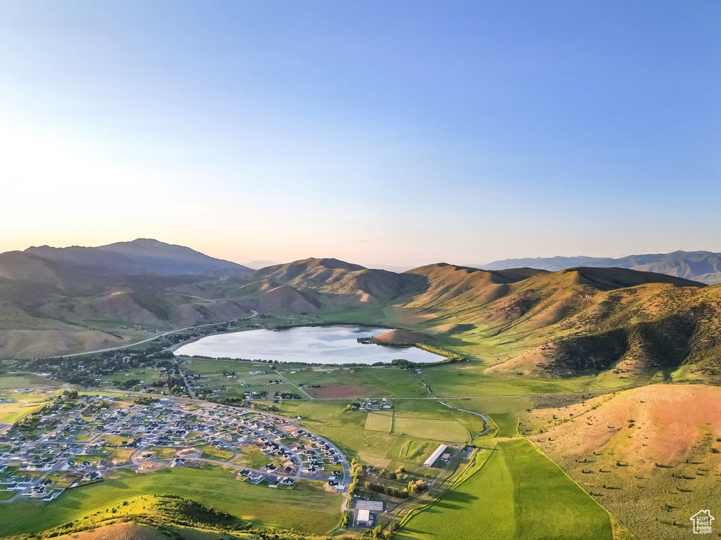 View of mountain backdrop with a nearby body of water