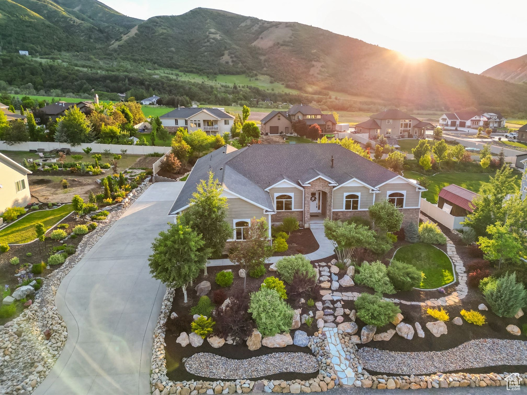 Aerial view of residential area with a mountain backdrop