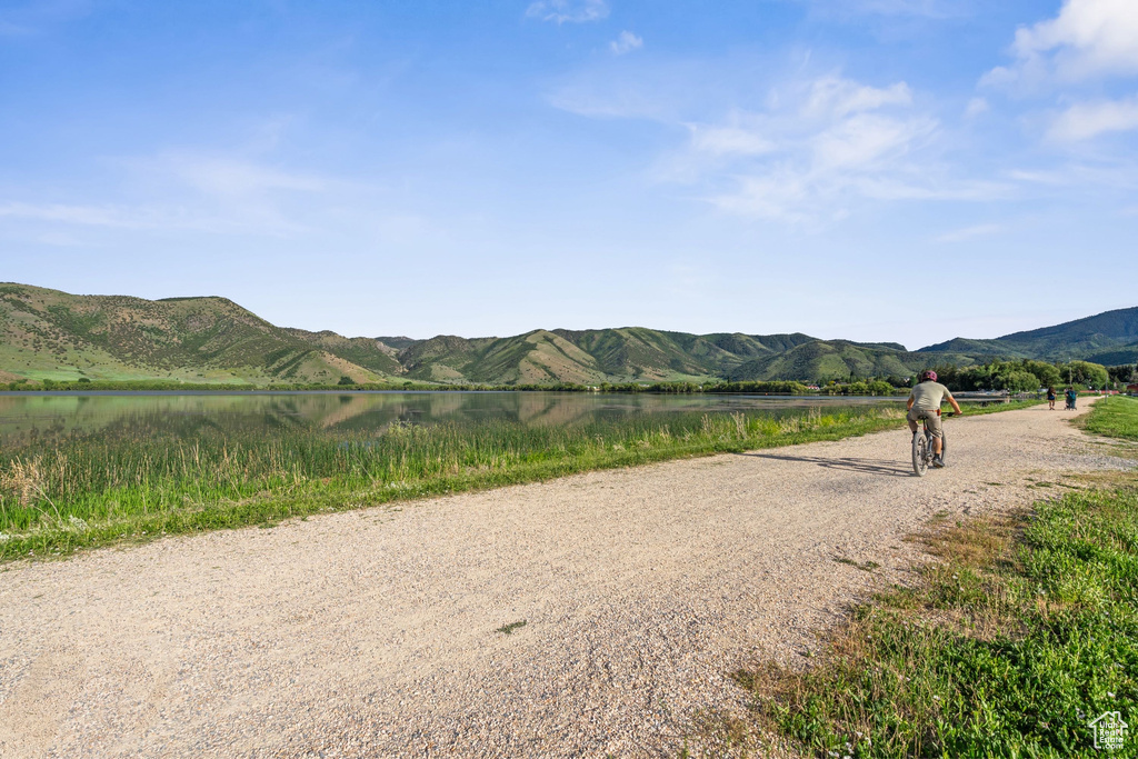 View of mountain background with a nearby body of water