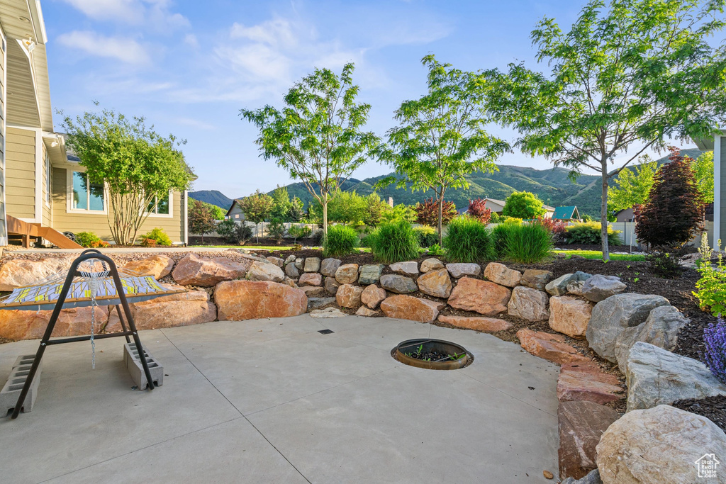 View of patio / terrace with a mountain view