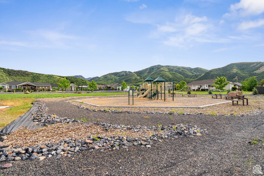 Community jungle gym with a mountain view