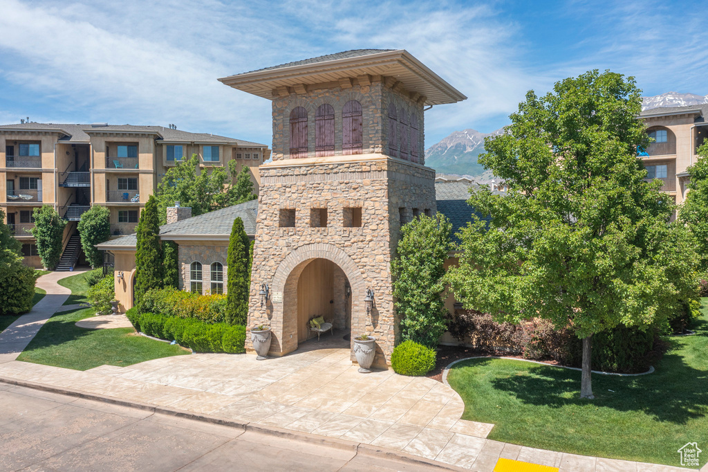 View of front of home featuring stone siding