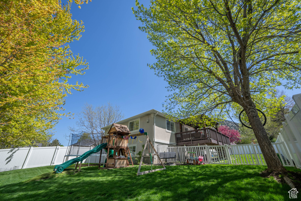 View of yard with a playground