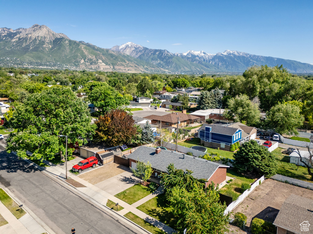 Aerial view of residential area featuring mountains