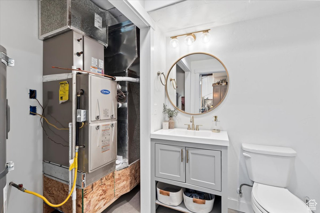 Bathroom with vanity and toilet