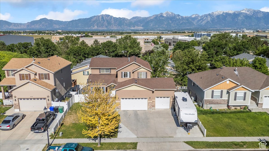 Aerial view of residential area with mountains