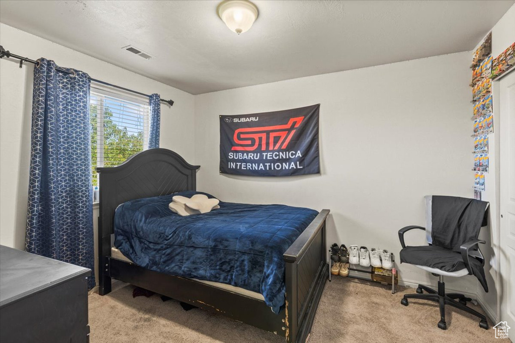 View of carpeted bedroom