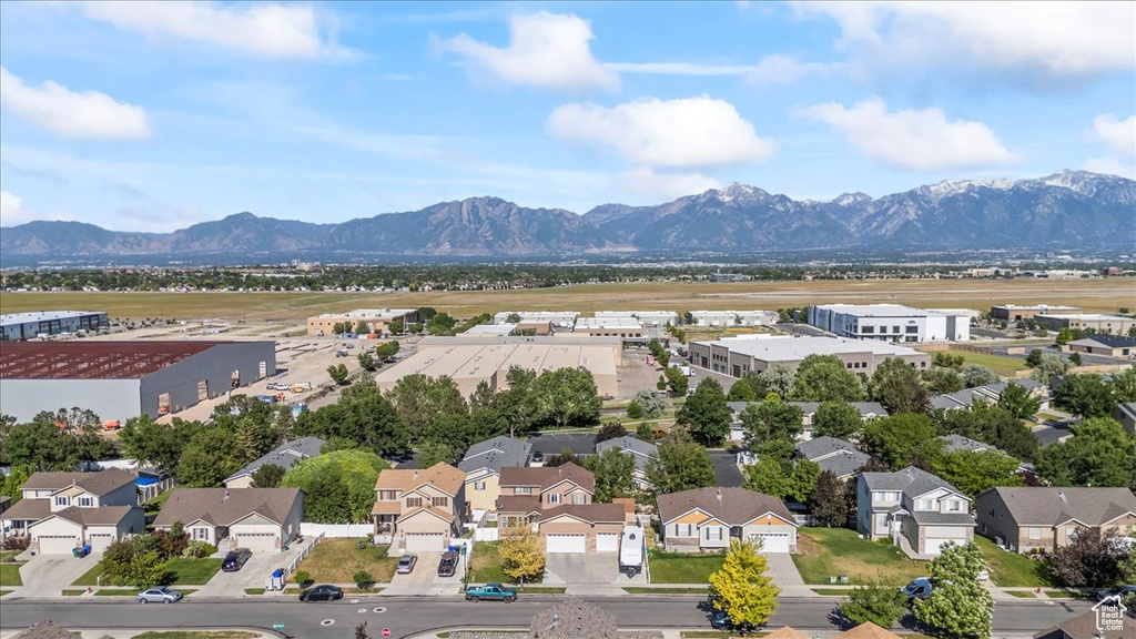 Aerial view of residential area with a mountain backdrop