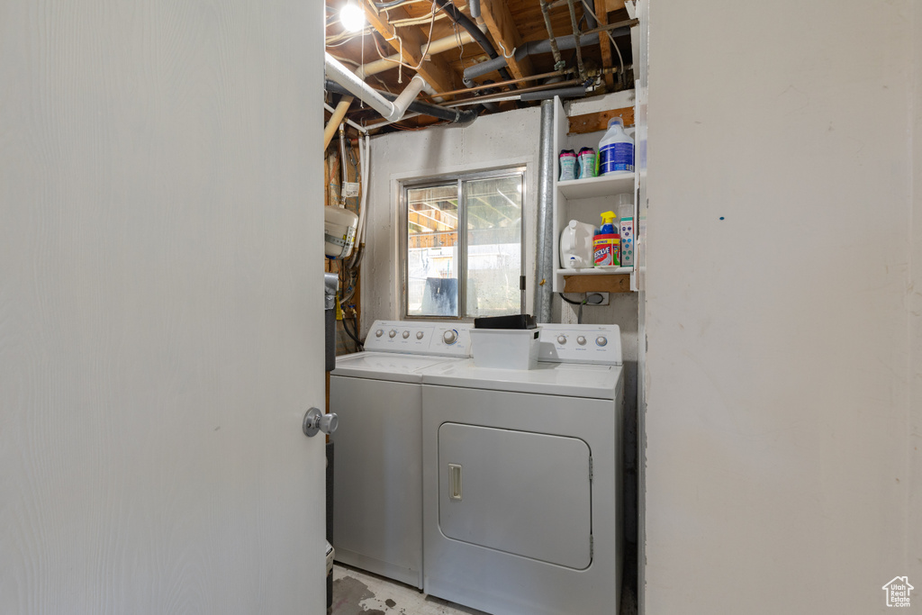 Laundry room featuring washing machine and dryer