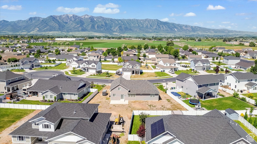 Aerial view of residential area with mountains