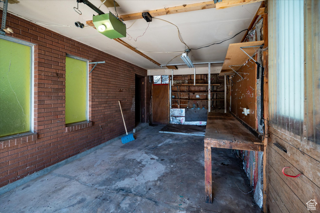 Garage featuring a garage door opener