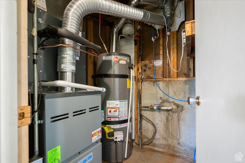 Utilities featuring strapped water heater