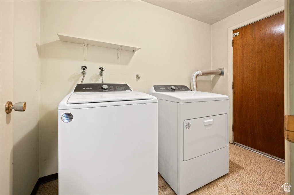 Laundry area featuring separate washer and dryer