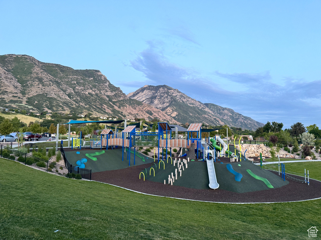 Community jungle gym with a mountain view