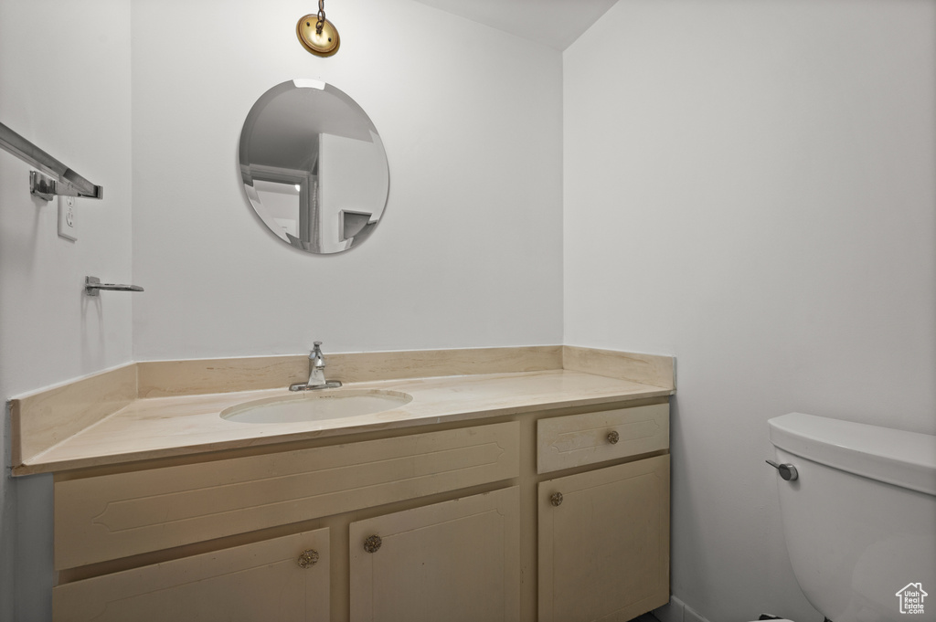 Bathroom with vanity and toilet