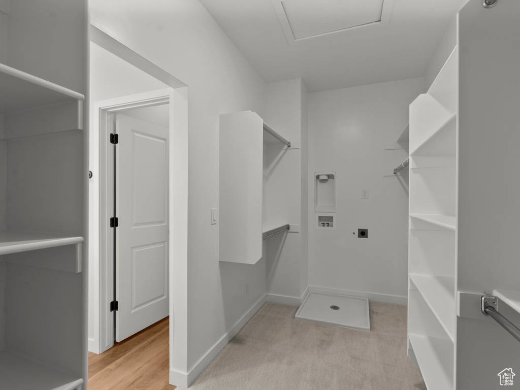 Walk in closet with attic access