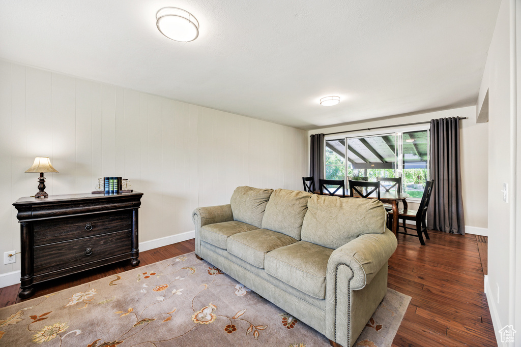 Living area featuring wood finished floors and baseboards