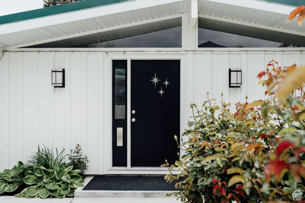 Entrance to property with board and batten siding