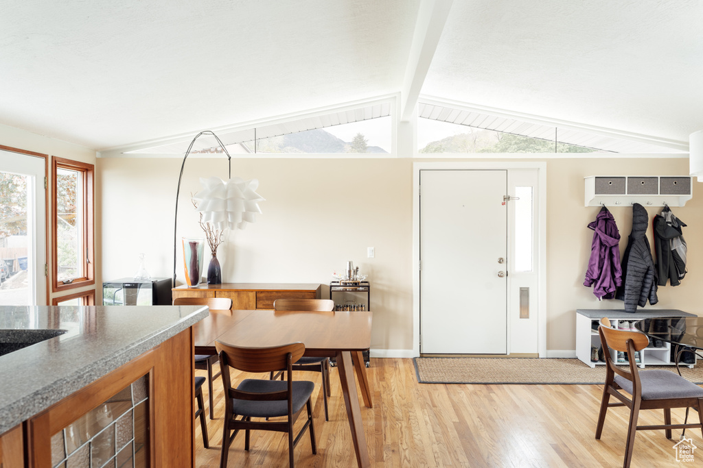 Entryway featuring light wood-style flooring and baseboards