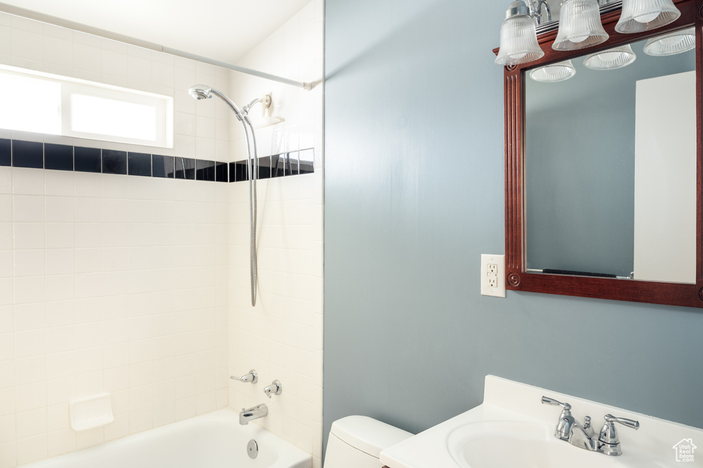 Full bath with toilet, shower / bath combination, and vanity