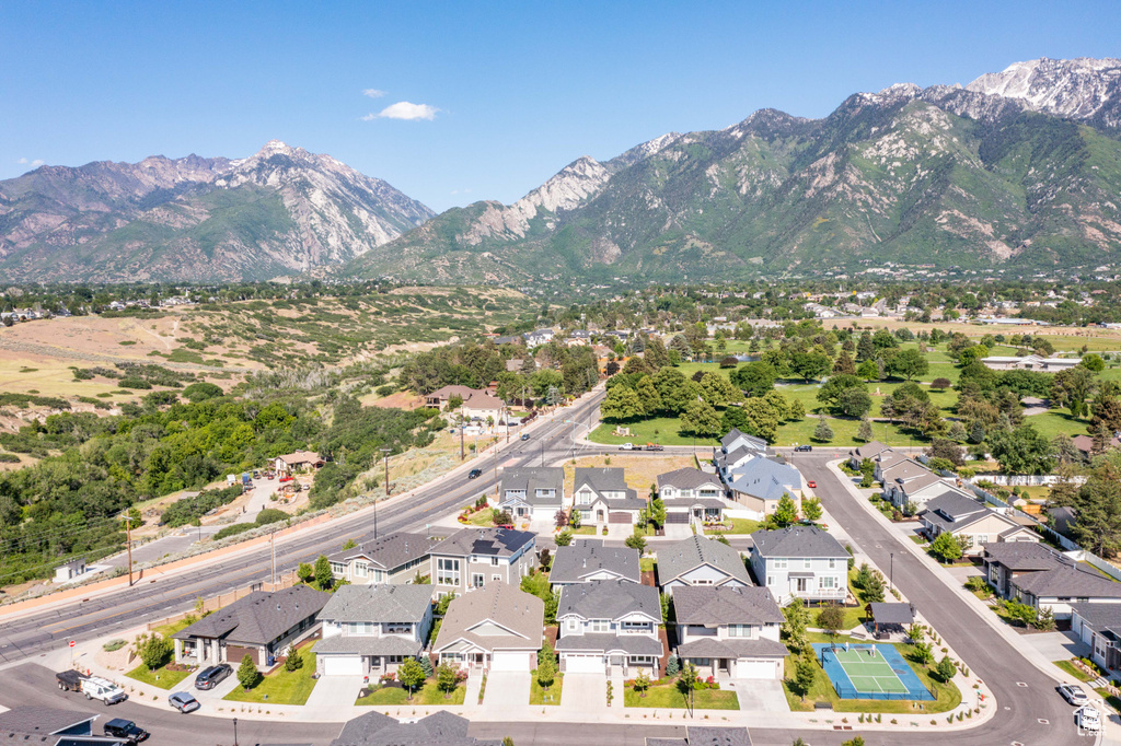 Aerial overview of property\\\\\\\\\\\\\\\'s location with a mountainous background and nearby suburban area