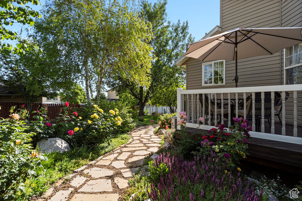 View of yard with a deck