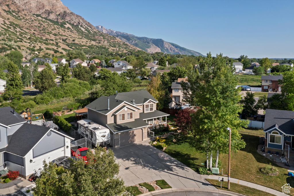 Aerial view of residential area with a mountain backdrop
