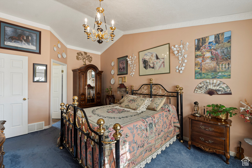 Carpeted bedroom featuring a chandelier, vaulted ceiling, and baseboards