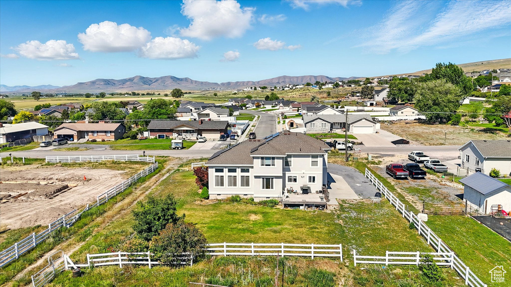 Aerial perspective of suburban area featuring mountains