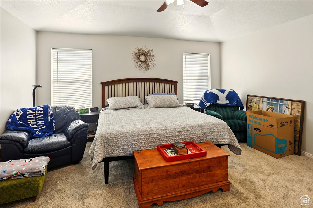Bedroom featuring carpet floors and ceiling fan