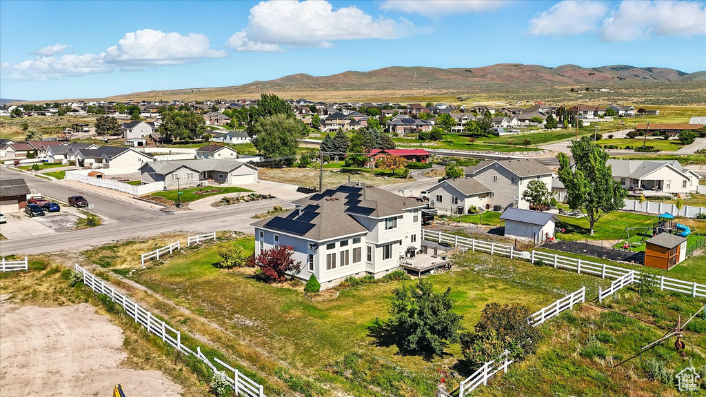 Aerial perspective of suburban area with mountains
