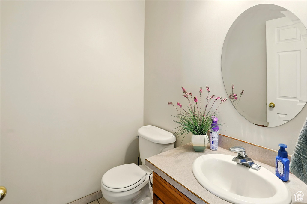 Bathroom featuring toilet and vanity